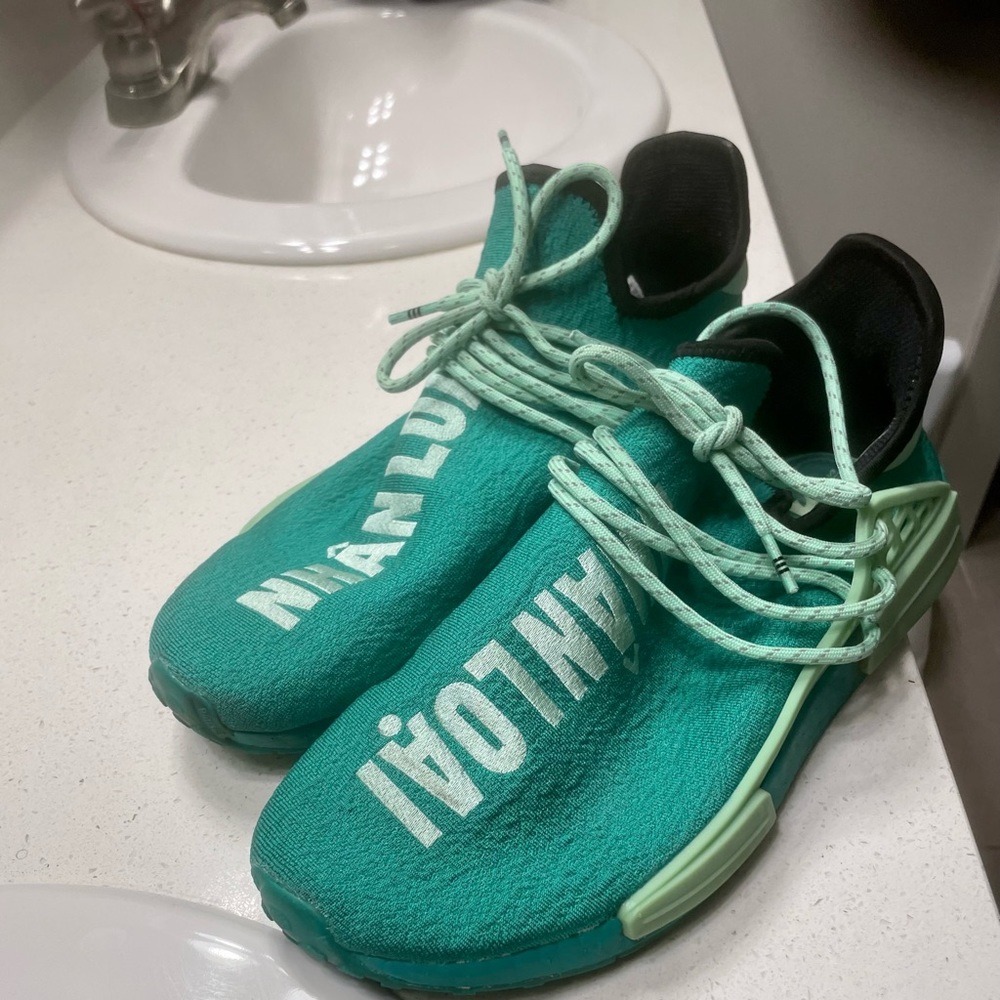 Adidas human race sneakers